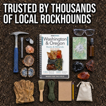 The Washington and Oregon field guide next to rock hunting tools